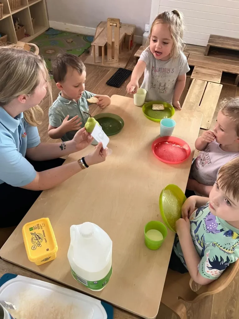 Kids having a snack and talking together
